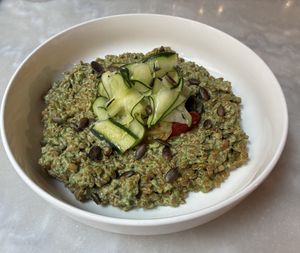 Risotto de petit épeautre, crémeux de roquette et basilic, tagliatelles de courgettes marinées.  at Comptoir Sauvage in Lyon