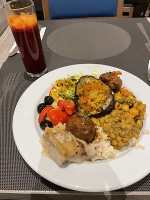 Dinner buffet plate, beet & carrot juice  at Jardim das Cerejas - Chiado in Lisbon
