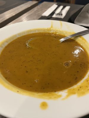 It tastes like a lentil soup.  It’s quite good.  They had this available every time I was there.  I think it’s the same soup every time but I’m not sure   at Jardim das Cerejas - Chiado in Lisbon