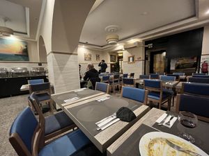Inside restaurant at night with my empty plate  at Jardim das Cerejas - Chiado in Lisbon