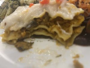 The inside of the weird cornbread lasagna .  I wouldn’t necessarily seek this out, but this wasn’t exactly bad either. I’d eat it again   at Jardim das Cerejas - Chiado in Lisbon