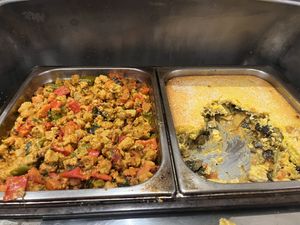 The plates in heaters.  The left one was really good.  The cornbread lasagna on right   at Jardim das Cerejas - Chiado in Lisbon