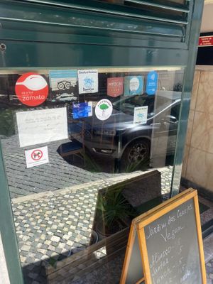 Two stickers   at Jardim das Cerejas - Chiado in Lisbon