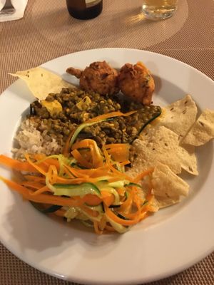 Curry with salad, pakora and papadom.   at Jardim das Cerejas - Chiado in Lisbon