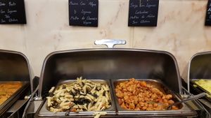 pasta with seaweed on left, tasty soya chunks on right at Jardim das Cerejas - Chiado in Lisbon