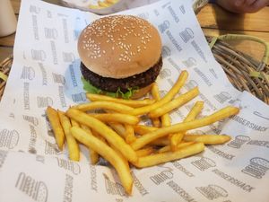 Black bean burger with fries at Burgershack in Kampot