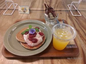 Vegan pancakes, ice cream and passion fruit juice. Really nice. at Rakuen Cafe in Naha