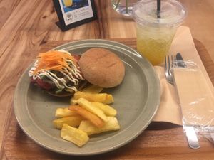 Multigrain burger set deal (burger, cassava, drink)  at Rakuen Cafe in Naha