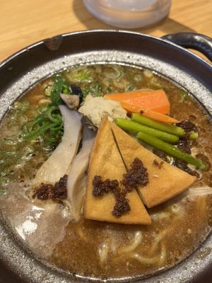 The presentation with a bit of miso on top   at Takesan Ramen - Obuse in Nagano