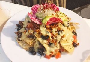 vegan nachos w “chorizo” and nacho cheese at Vespertina in Tulum