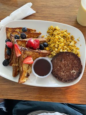 Breakfast platter with French Toast, Scrambled Tofu and Impossible sausage patty  at Palm Greens Cafe in Palm Springs