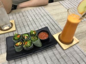 Avocado summer rolls and carrot, ginger and apple juice.  at Easy Health in Pattaya