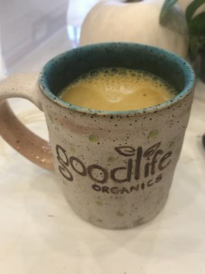 Golden Milk made with banana milk. So warm and delicious. Made with turmeric, ginger, maca, goji Berry, frankincense, cardamom, and black pepper. at Good Life Organics in Shillington