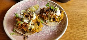 Sweet potato and black bean tacos with cashew cream and vegan feta at Friend of Mine  in Bridge Of Allan