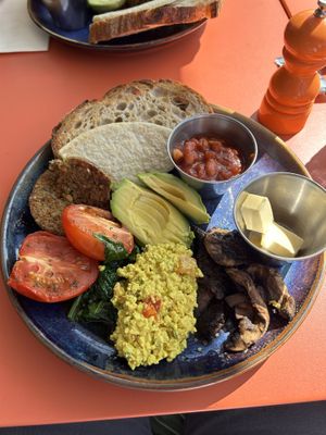 Vegan brunch (toast, maple beans, haggis, avocado, tomato, spinach, miso mushrooms and tofu scramble)  at Friend of Mine  in Bridge Of Allan