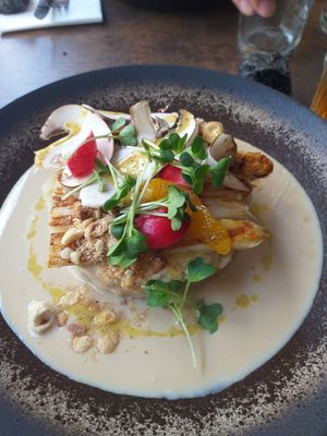 Un plat : purée de noisettes avec plein de bonnes choses dessus at Le Potager de Charlotte - Rennequin in Paris