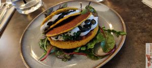 Chickpea and rice pancake : cashew cream, greens, chives, espelette pepper at Le Potager de Charlotte - Rennequin in Paris