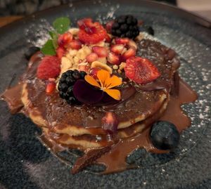 Almond & Rice Pancakes dessert (hazelnut cacao cream, hazelnuts, fresh fruits and agave at Le Potager de Charlotte - Rennequin in Paris