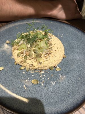 Hummus (good but comes with stale bread)  at Le Potager de Charlotte - Rennequin in Paris