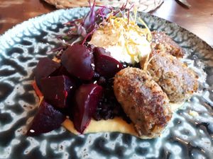 "Chicken" left A, corn puree, black rice, smoked beetroot and yoghurt and dill foam at Coco Cuina Viva in Cadaques