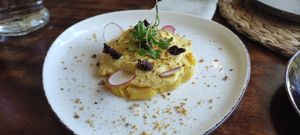 Causa limeña de patata y tofu at Coco Cuina Viva in Cadaques