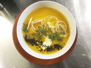 Pumpkin cream with coconut milk and ginger.
Crema de calabaza con leche de coco y jengibre. at Coco Cuina Viva in Cadaques