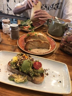 Avocado toast, hummus & bread, cheese & tomato sandwich.  at Esquires in Tunbridge Wells
