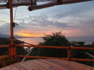 Beautiful sunset view at Blue Earth Village in Bunutan