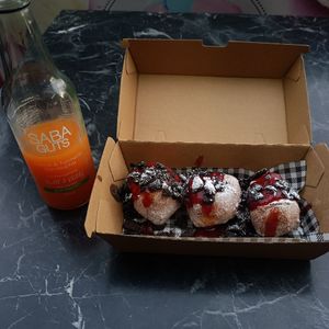 carrot kombucha and vegan oreo jam doughnuts at Vermont Pizzeria in Vermont