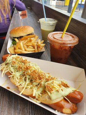 Vegan Mountain burger and classic chips
Vegan Mountain hotdog with avocado and cheese  at Simple and Good in Enfield