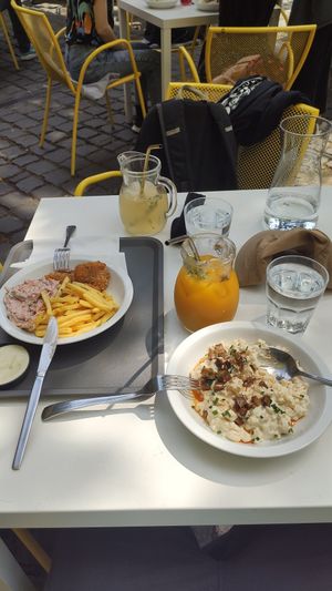 The 'schnitzel" with fries and coleslaw on the left, the Halushky on the right. We both hade lemonade ( elderberry and mango), it was just perfect at Made with Laf in Bratislava