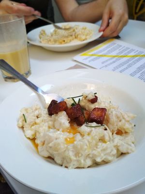 Traditional Halusky with grilled tempeh and chives on top, as served in October 2019. at Made with Laf in Bratislava