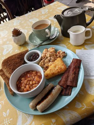 Another tasty vegan 'all day' breakfast with harissa tofu scramble, vegan bacon, meat free Richmond sausage, Ruth's chutney, beans, toast & hash brown at Woodchats in Chorley