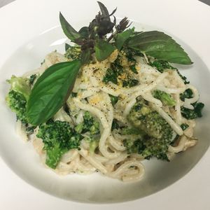 Alfredo Noodles - rich garlicky cashew cream on rice noodles with broccoli and chopped kale. GF also! at Modern Shaman in Whittier