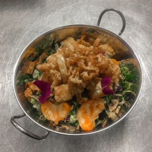 the Chinese (it isn't Chicken) Salad Bowl. with fried seasoned tofu, fresh mandarins (not canned), wontons, almonds, black sesame seeds at Modern Shaman in Whittier