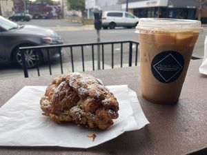 The almond croissant and an oat milk caramel latte!  at Hazel & Jade Bakery in San Diego