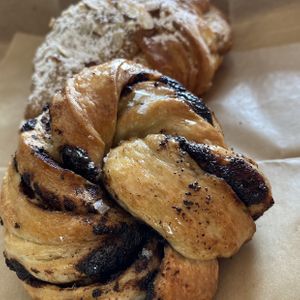 Chocolate bun and almond croissant! So good!!  at Hazel & Jade Bakery in San Diego