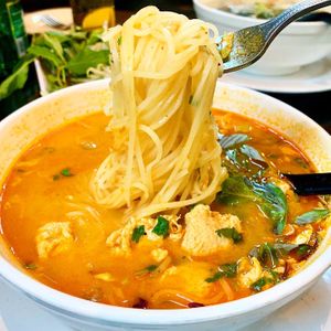 Coconut chili noodle soup with vegan chick’n at Holy Basil Pho in Oakland