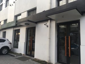 Street side shop front  at Uni Con - YǔNèi LièGuó Qīng Shū LiàoLǐ in Dalian