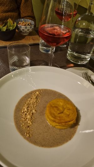 Flan di zucca con salsa alle nocciole at Herbe in Reggio Emilia