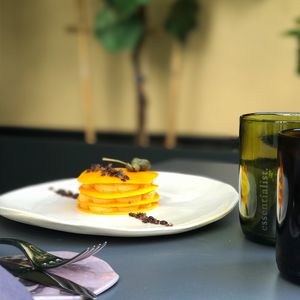 raw pumpkin parmigiana  at Herbe in Reggio Emilia