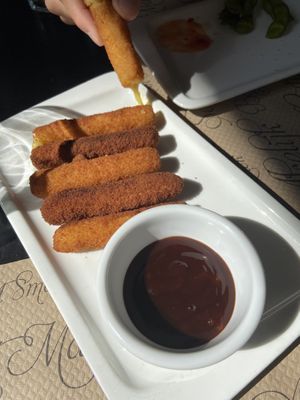 We asked them to split it into two plates - so this is half of a toast with “turkey” and “cheese”, with edamame on the side  at La Factoría Vegana in Leon