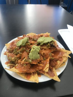 Nachos with tofu, jalapenos, vegan cheese and guacamole at La Factoría Vegana in Leon