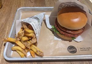 Rebel Burger with fries at The Butcher in Bern