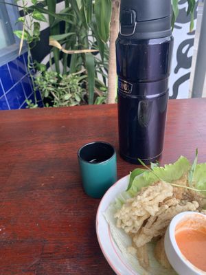 oyster mushroom calamari and tea sitting out the front at Shop Bao Ngoc in Brunswick