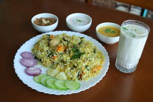 Vegetable Biryani with Raitha, Salan, Buttermilk, and Double ka Meetha. All Vegan! at Plantarium in Hyderabad