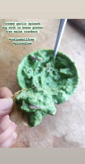 Creamy garlic spinach dip with in-house glutenfree maize crackers at Plantarium in Hyderabad