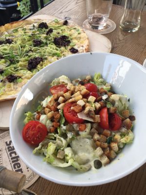 ceasar salad and tarte flambé  at Brauhaus Sacher in Leonberg