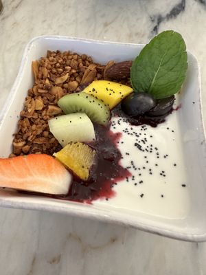 Granola with vegan yogurt and berry coláis   at Manjerica in Lisbon