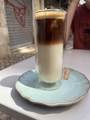 Iced latte macchiato with oat milk   at Manjerica in Lisbon